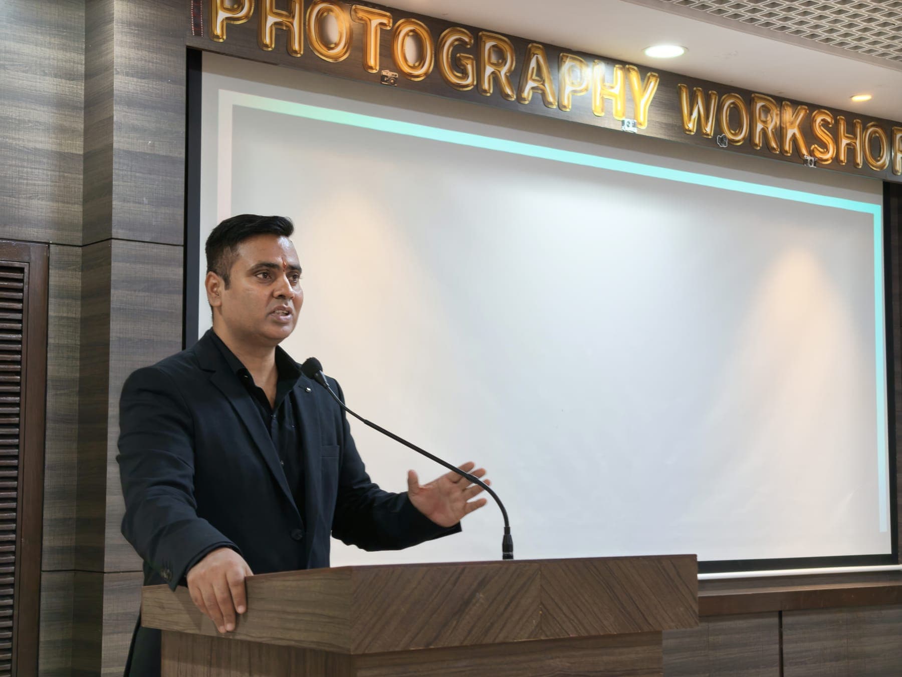 At the podium